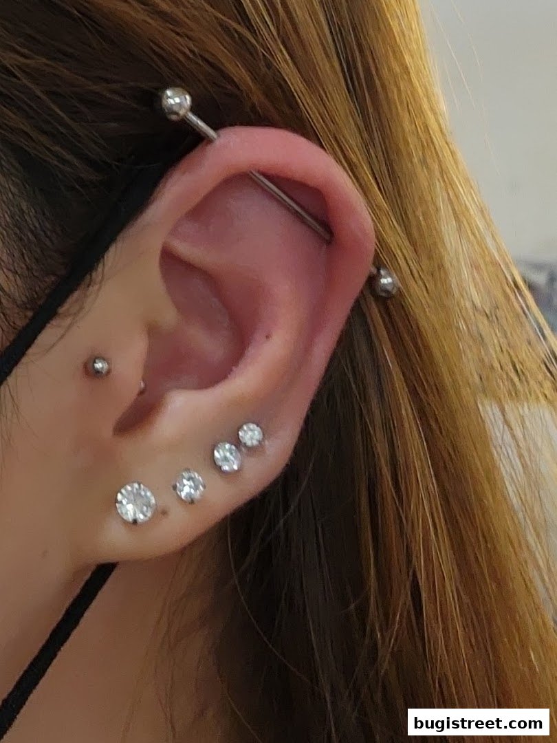 Stylish Ear Piercings by Bugis Tattoo