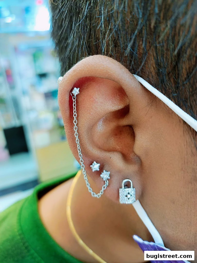 Sparkling Ear Piercings: Stars, Chains, and Locks!