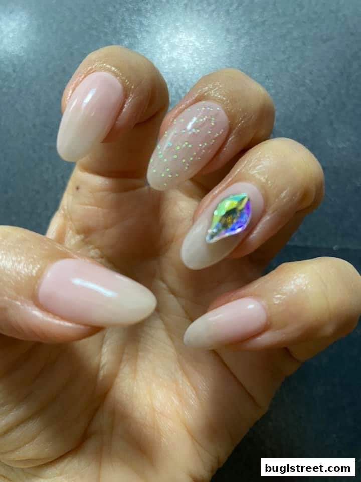 Elegant Nails: Glitter & Rhinestone Manicure