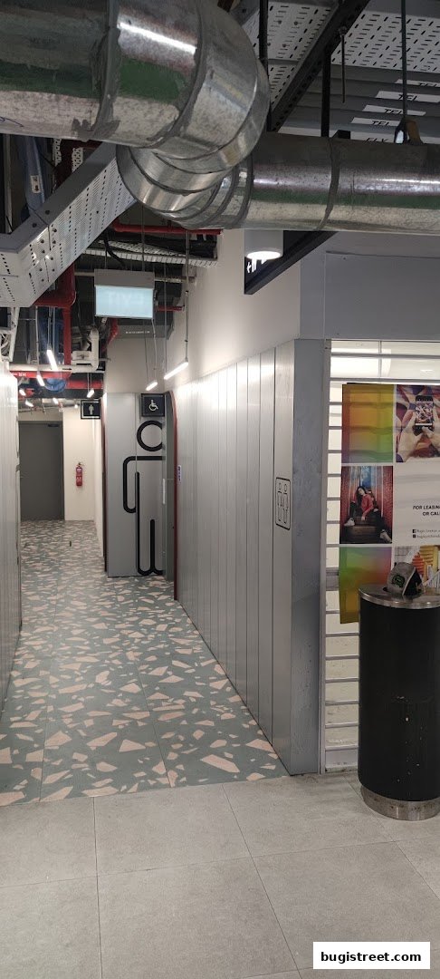 Modern Hallway with Restroom Access