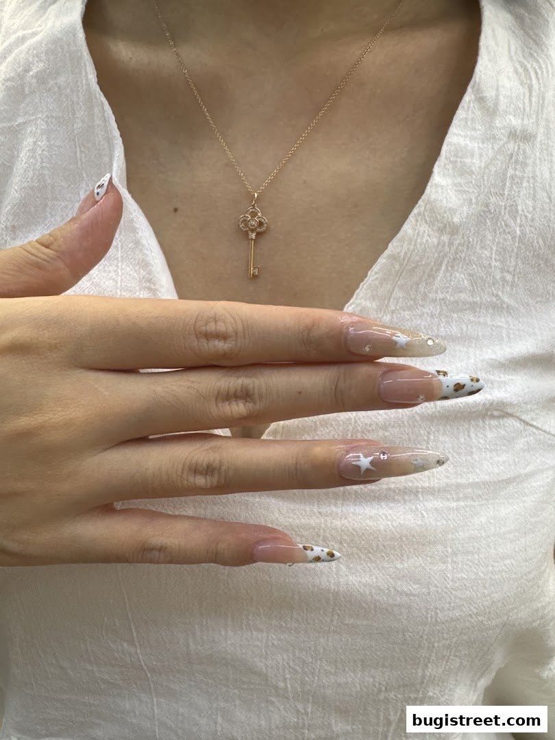 Elegant Key Necklace & Chic Nails