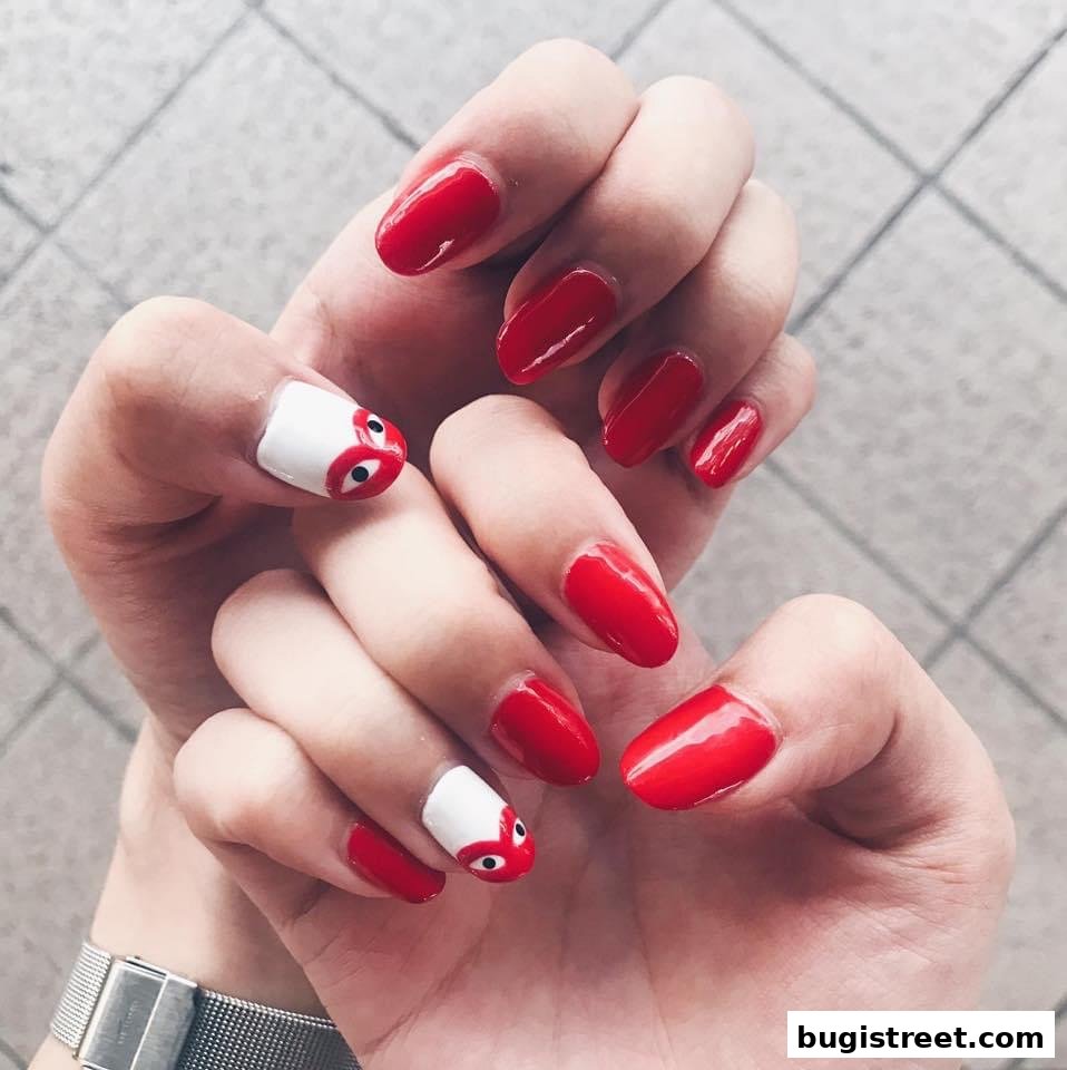 Biena Nails: Expressive Red & Playful Nail Art!