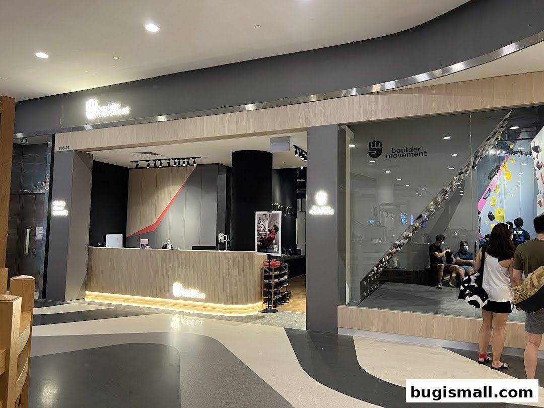 The entrance and reception area of Boulder Movement, a bouldering gym.