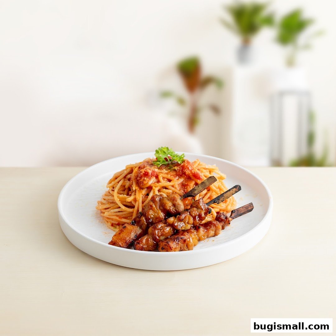 Delicious Spaghetti and Meat Skewers Combo