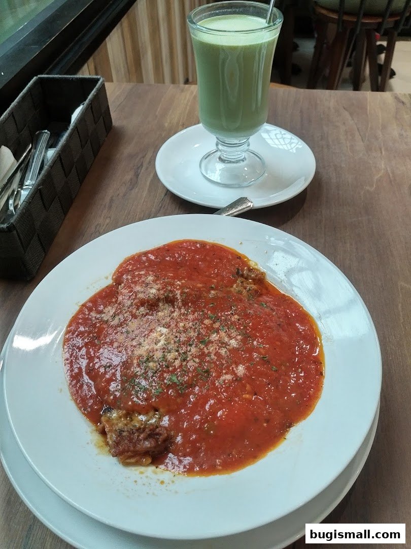 Delicious Italian Meal and Refreshing Green Drink