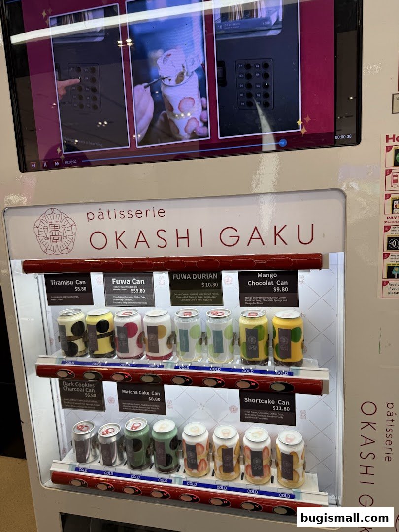 A vending machine displaying various dessert cans from Okashi Gaku.