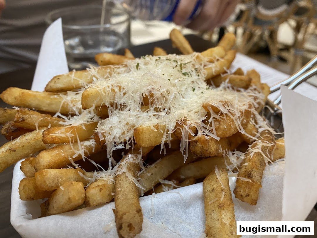 Delicious Parmesan Truffle Fries at Poulet!