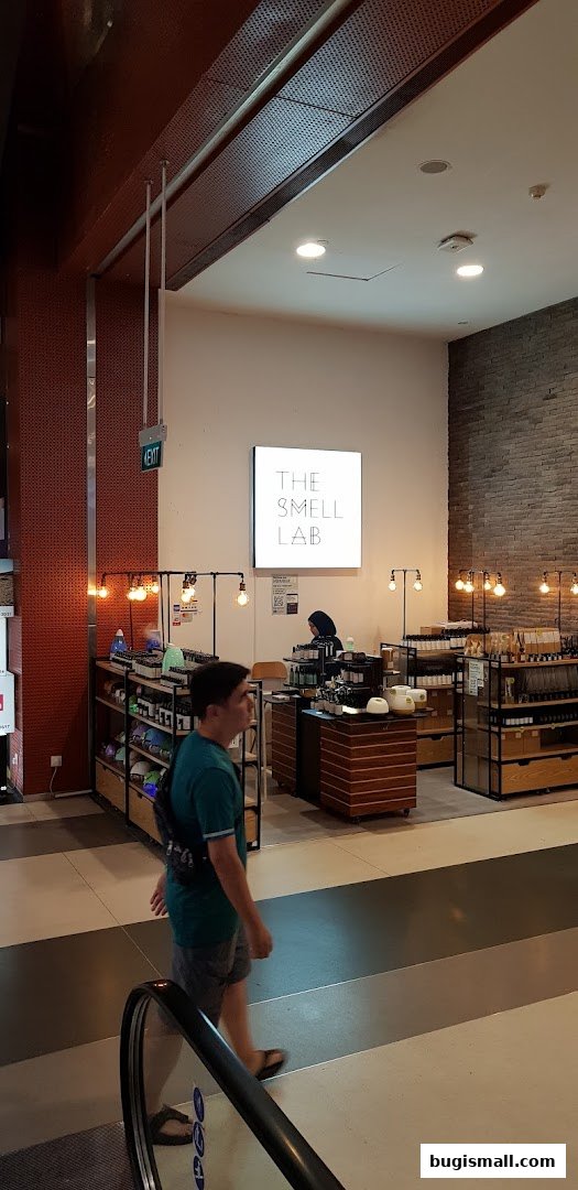 The Smell Lab shop interior with shelves of products and a counter.